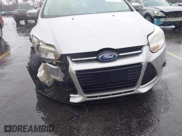 2013 Ford Focus SE with VIN 1FADP3F22DL354250, listed as a IAAI auction lot 41727693 with 171,011 mi miles. Bid and sale history available at carsss.com. Image 6.