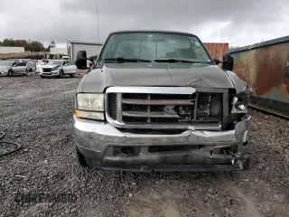 2003 Ford F-250 XL z VIN 1FTNX20F73EA04409, wystawiony jako Copart lot #84228714 z przebiegiem 142 641 mil mil oraz Szkoda całkowita • Salvage title. Historia ofert i sprzedaży dostępna na DreamBid. Obrazek 5.
