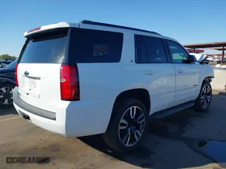 2019 Chevrolet Tahoe LT with VIN 1GNSCBKC7KR183874, listed as a IAAI auction lot 41347304 with 118,902 mi miles. Bid and sale history available at carsss.com. Image 4.