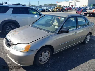 2002 Honda Civic LX with VIN 2HGES16642H550934, listed as a IAAI auction lot 41771762 with 207,727 mi miles. Bid and sale history available at carsss.com. Image 2.