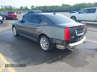 2009 Cadillac STS AWD w/1SB with VIN 1G6DD67V090151883, listed as a IAAI auction lot 42075438 with 97,408 mi miles. Bid and sale history available at carsss.com. Image 3.
