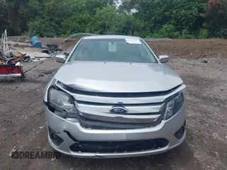 2012 Ford Fusion SE z VIN 3FAHP0HA3CR421636, wystawiony jako IAAI lot #42454385 z przebiegiem 138 282 mil mil oraz . Historia ofert i sprzedaży dostępna na DreamBid. Obrazek 12.