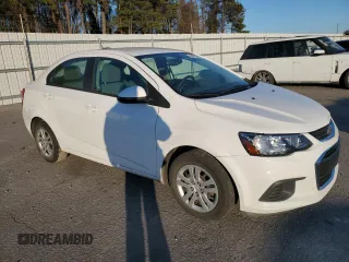 2018 Chevrolet Sonic LS with VIN 1G1JB5SH8J4121988, listed as a Copart auction lot 88000095 with 64,875 mi miles and Salvage title. Bid and sale history available at DreamBid. Image 4.