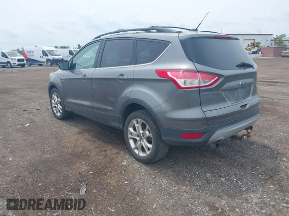 2013 Ford Escape SE with VIN 1FMCU0GX2DUA31362, listed as a IAAI auction lot 42564337 with 157,737 mi miles and . Bid and sale history available at DreamBid. Image 3.