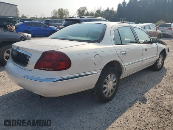 2001 Lincoln Continental with VIN 1LNHM97V91Y659769, listed as a Copart auction lot 71220804 with 0 mi miles and Salvage Title. Bid and sale history available at carsss.com. Image 3.
