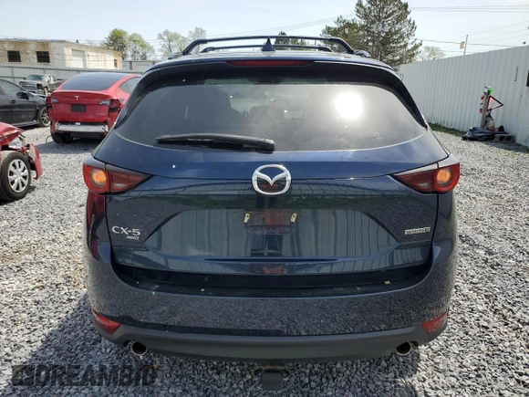 2021 Mazda CX-5 Touring with VIN JM3KFBCM0M0302015, listed as a Copart auction lot 55077305 with 40,558 mi miles and Salvage Title. Bid and sale history available at carsss.com. Image 6.