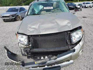 2011 Ford Escape Limited с VIN 1FMCU0EG2BKB19100, выставлен на аукционе Copart как лот 58410295 с пробегом Не указан миль и Списание • Salvage title. История ставок и продаж доступна на DreamBid. Изображение 5.