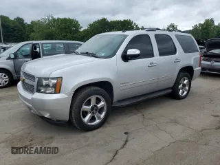2012 Chevrolet Tahoe LTZ with VIN 1GNSKCE04CR206507, listed as a Copart auction lot 65142485 with 154,511 mi miles and Clean title. Bid and sale history available at DreamBid. Image 1.