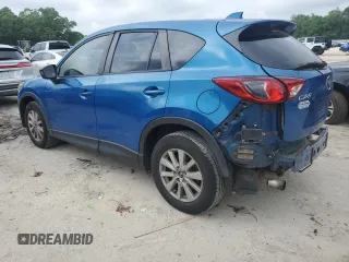 2013 Mazda CX-5 Touring with VIN JM3KE2CE5D0105420, listed as a Copart auction lot 50880655 with 250,524 mi miles and Salvage Title. Bid and sale history available at carsss.com. Image 2.