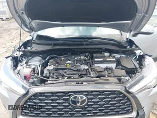 2023 Toyota Corolla Cross XLE with VIN 7MUDAAAG0PV057750, listed as a IAAI auction lot 42302284 with 31,404 mi miles and . Bid and sale history available at DreamBid. Image 10.