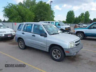 1999 Chevrolet Tracker z VIN 2CNBE13C4X6924119, wystawiony jako IAAI lot #42491953 z przebiegiem 169 523 mil mil oraz . Historia ofert i sprzedaży dostępna na DreamBid. Obrazek 1.
