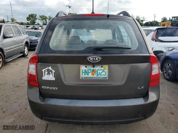 2009 Kia Rondo LX Base with VIN KNAFG528397257483, listed as a Copart auction lot 73800174 with 0 mi miles and Salvage Title. Bid and sale history available at carsss.com. Image 6.