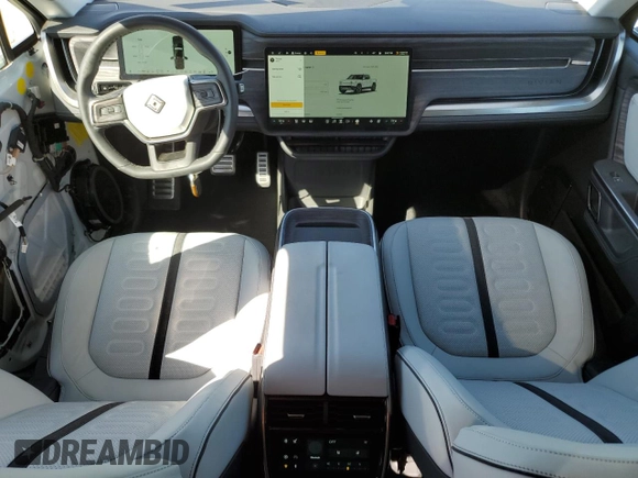 2024 Rivian R1T Adventure z VIN 7FCTGCAA9RN030318, wystawiony jako Copart lot #77036474 z przebiegiem 3 522 mil mil oraz Szkoda całkowita • Salvage title. Historia ofert i sprzedaży dostępna na DreamBid. Obrazek 8.