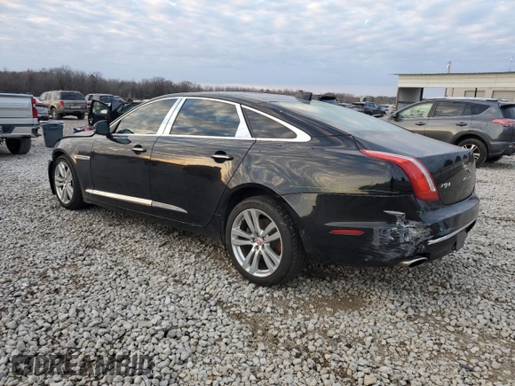 2016 Jaguar XJ Portfolio with VIN SAJWA2G71G8V95573, listed as a Copart auction lot 85975594 with 82,221 mi miles and Salvage title. Bid and sale history available at DreamBid. Image 2.