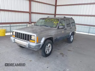 2000 Jeep Cherokee z VIN 1J4FF48S1YL273555, wystawiony jako IAAI lot #42249135 z przebiegiem 184 674 mil mil oraz . Historia ofert i sprzedaży dostępna na DreamBid. Obrazek 2.