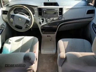 2012 Toyota Sienna with VIN 5TDZK3DC6CS180125, listed as a Copart auction lot 49168735 with 177,951 mi miles and Salvage title. Bid and sale history available at DreamBid. Image 8.