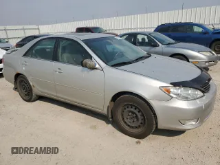 2006 Toyota Camry LE z VIN 4T1BF30K66U115872, wystawiony jako Copart lot #60526695 z przebiegiem 164 561 mil mil oraz Szkoda całkowita • Salvage title. Historia ofert i sprzedaży dostępna na DreamBid. Obrazek 4.