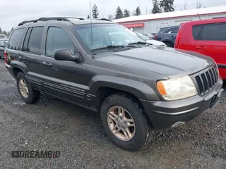 1999 Jeep Grand Cherokee Limited with VIN 1J4GW68N7XC739479, listed as a IAAI auction lot 41448323 with 129,840 mi miles. Bid and sale history available at carsss.com. Image 1.