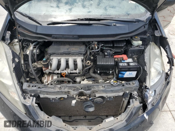 2011 Honda Fit Sport z VIN JHMGE8H51BC015640, wystawiony jako Copart lot #57870555 z przebiegiem 179 497 mil mil oraz Szkoda całkowita • Salvage title. Historia ofert i sprzedaży dostępna na DreamBid. Obrazek 12.