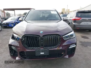 2021 BMW X5 M50i with VIN 5UXJU4C04M9G03418, listed as a IAAI auction lot 40705167 with 24,073 mi miles and . Bid and sale history available at DreamBid. Image 13.