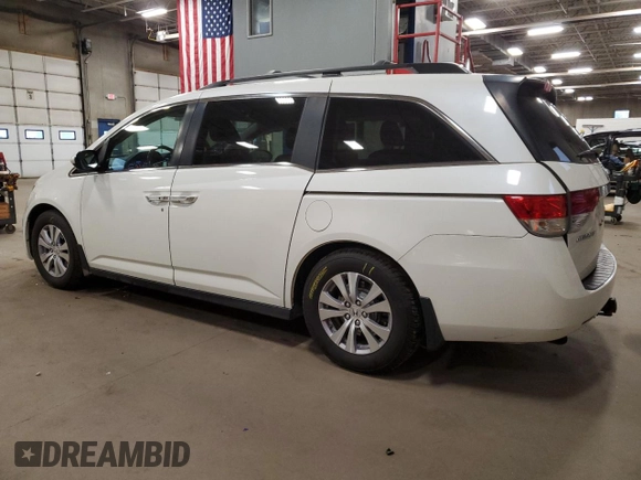 2016 Honda Odyssey EX-L with VIN 5FNRL5H67GB090747, listed as a Copart auction lot 53957235 with 131,464 mi miles and Salvage Title. Bid and sale history available at DreamBid. Image 2.