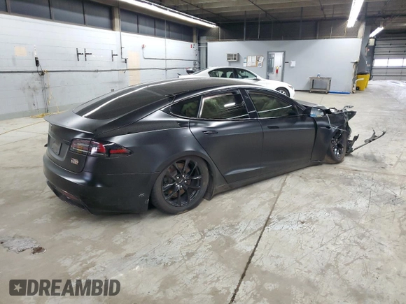 2022 Tesla Model S Plaid с VIN 5YJSA1E65NF487665, выставлен на аукционе Copart как лот 55261025 с пробегом Не указан миль и Списание • Salvage title. История ставок и продаж доступна на DreamBid. Изображение 3.