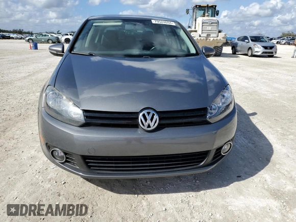 2014 Volkswagen Golf TDI w/Sunroof & Nav z VIN WVWDM7AJ7EW003715, wystawiony jako Copart lot #79524694 z przebiegiem Nie podano mil oraz Szkoda całkowita • Salvage title. Historia ofert i sprzedaży dostępna na DreamBid. Obrazek 5.