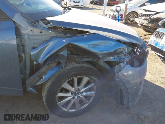 2016 Mazda CX-5 Sport with VIN JM3KE2BY3G0641895, listed as a IAAI auction lot 41689138 with 121,636 mi miles and . Bid and sale history available at DreamBid. Image 6.