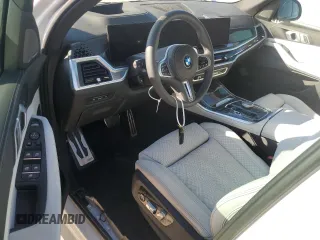 2024 BMW X5 M60i with VIN 5UX33EU01R9U55250, listed as a Copart auction lot 84268944 with 0 mi miles and Non Repairable. Bid and sale history available at carsss.com. Image 8.