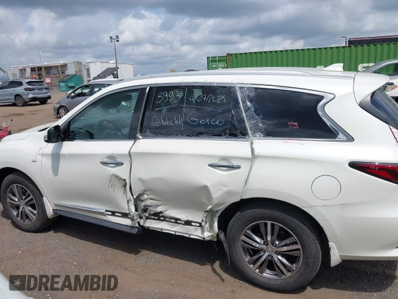 2020 Infiniti QX60 Luxe with VIN 5N1DL0MM2LC506031, listed as a IAAI auction lot 42701561 with 31,424 mi miles and . Bid and sale history available at DreamBid. Image 14.