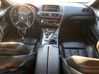 2015 BMW M6 z VIN WBS6C9C52FD468030, wystawiony jako Copart lot #81739974 z przebiegiem 66 861 mil mil oraz Szkoda całkowita • Salvage title. Historia ofert i sprzedaży dostępna na DreamBid. Obrazek 8.