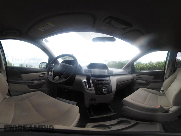 2013 Honda Odyssey LX with VIN 5FNRL5H25DB080209, listed as a IAAI auction lot 42123644 with 157,631 mi miles and . Bid and sale history available at carsss.com. Image 22.