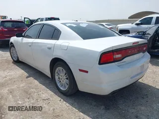2013 Dodge Charger SXT with VIN 2C3CDXHG0DH664865, listed as a IAAI auction lot 41914053 with 195,211 mi miles. Bid and sale history available at carsss.com. Image 3.