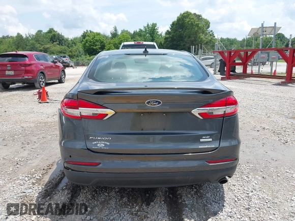 2020 Ford Fusion SE z VIN 3FA6P0HD6LR160147, wystawiony jako IAAI lot #42499983 z przebiegiem 73 971 mil mil oraz . Historia ofert i sprzedaży dostępna na DreamBid. Obrazek 17.