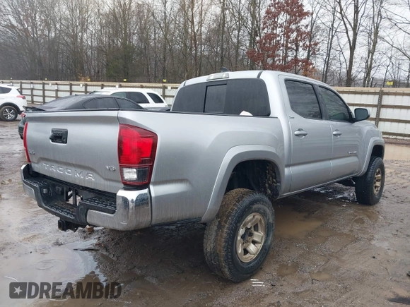 2018 Toyota Tacoma SR with VIN 3TMCZ5AN4JM148581, listed as a IAAI auction lot 41462945 with 115,655 mi miles. Bid and sale history available at carsss.com. Image 4.