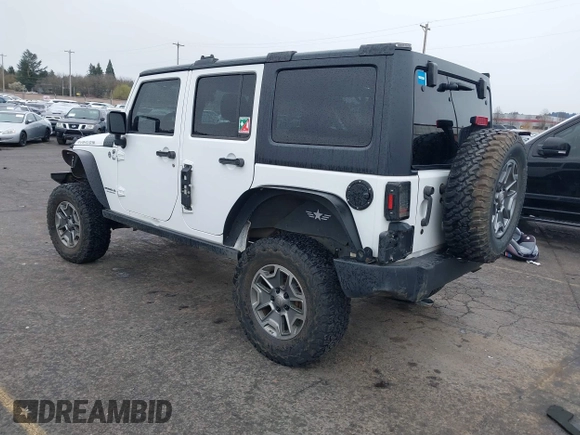2014 Jeep Wrangler Unlimited Rubicon with VIN 1C4BJWFGXEL283929, listed as a IAAI auction lot 41812052 with 137,790 mi miles and . Bid and sale history available at DreamBid. Image 3.