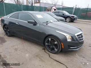 2015 Cadillac ATS Coupe Standard RWD with VIN 1G6AA1RX8F0122088, listed as a IAAI auction lot 41543354 with NaN miles. Bid and sale history available at carsss.com. Image 1.