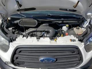 2016 Ford Transit Cargo z VIN 1FTYR1ZM3GKA64620, wystawiony jako Copart lot #44920645 z przebiegiem 132 952 mil mil oraz Szkoda całkowita • Salvage title. Historia ofert i sprzedaży dostępna na DreamBid. Obrazek 12.