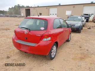 2009 Toyota Yaris with VIN JTDJT903595243068, listed as a IAAI auction lot 41899358 with 310,199 mi miles. Bid and sale history available at carsss.com. Image 4.