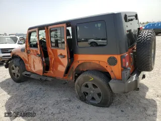 2010 Jeep Wrangler Unlimited Sport with VIN 1J4BA3H10AL223539, listed as a Copart auction lot 49852195 with 108,157 mi miles and Salvage Title. Bid and sale history available at carsss.com. Image 2.