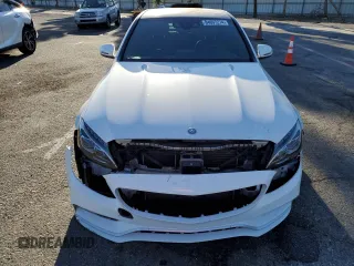 2017 Mercedes-Benz C 63 AMG with VIN 55SWF8GB0HU194099, listed as a Copart auction lot 84697274 with 79,948 mi miles and Salvage title. Bid and sale history available at DreamBid. Image 5.