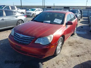 2008 Chrysler Sebring Touring z VIN 1C3LC56KX8N261620, wystawiony jako IAAI lot #41663202 z przebiegiem 194 237 mil mil oraz . Historia ofert i sprzedaży dostępna na DreamBid. Obrazek 2.