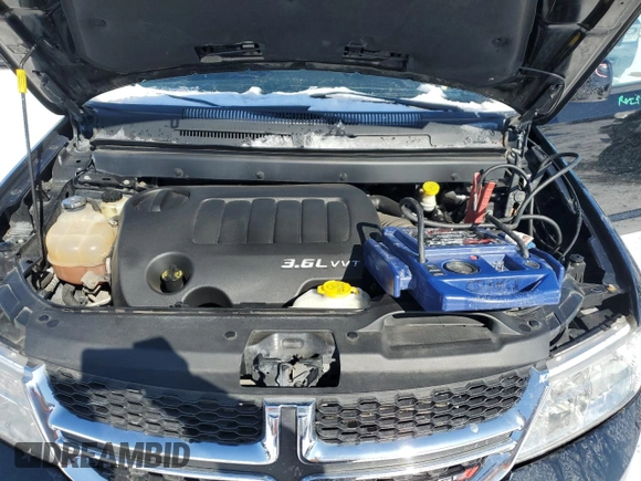 2014 Dodge Journey SXT z VIN 3C4PDCBG6ET238816, wystawiony jako Copart lot #45986675 z przebiegiem 174 452 mil mil oraz Szkoda całkowita • Salvage title. Historia ofert i sprzedaży dostępna na DreamBid. Obrazek 14.