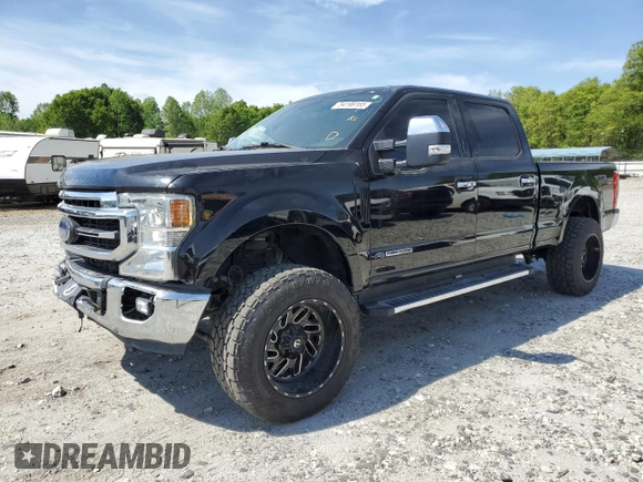 2021 Ford Super Duty F-250 SRW XL with VIN 1FT7W2BT1MEC51277, listed as a Copart auction lot 54199165 with 99,324 mi miles and Salvage Title. Bid and sale history available at carsss.com. Image 1.