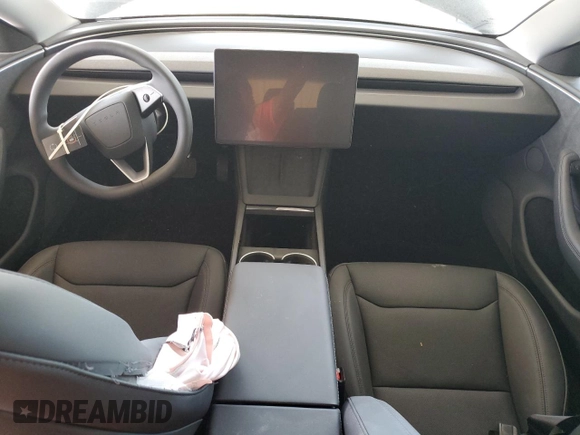 2025 Tesla Model 3 Long Range with VIN 5YJ3E1EBXSF941345, listed as a Copart auction lot 60229865 with 1,711 mi miles and Salvage title. Bid and sale history available at DreamBid. Image 8.