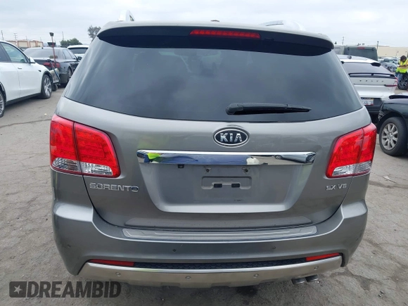 2013 Kia Sorento SX z VIN 5XYKW4A23DG400942, wystawiony jako IAAI lot #42185267 z przebiegiem 162 209 mil mil oraz . Historia ofert i sprzedaży dostępna na DreamBid. Obrazek 16.
