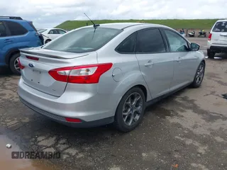 2014 Ford Focus SE with VIN 1FADP3F24EL323728, listed as a IAAI auction lot 41826974 with 141,357 mi miles and . Bid and sale history available at DreamBid. Image 4.
