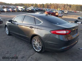 2016 Ford Fusion SE with VIN 3FA6P0HD6GR301773, listed as a IAAI auction lot 41007232 with 98,269 mi miles. Bid and sale history available at carsss.com. Image 3.