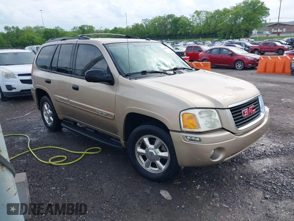 2005 GMC Envoy SLT with VIN 1GKDS13S452141376, listed as a IAAI auction lot 42095025 with 198,911 mi miles and . Bid and sale history available at DreamBid. Image 1.