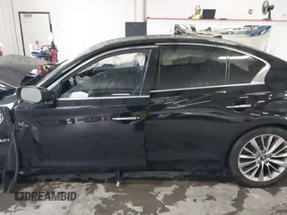 2019 Infiniti Q50 3.0t LUXE with VIN JN1EV7AP1KM512392, listed as a IAAI auction lot 40055915 with 103,485 mi miles. Bid and sale history available at carsss.com. Image 14.